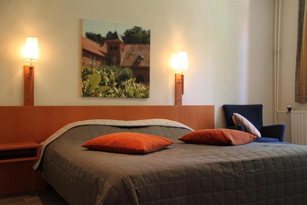 Hotel De Volksabdij Ossendrecht Quarto foto